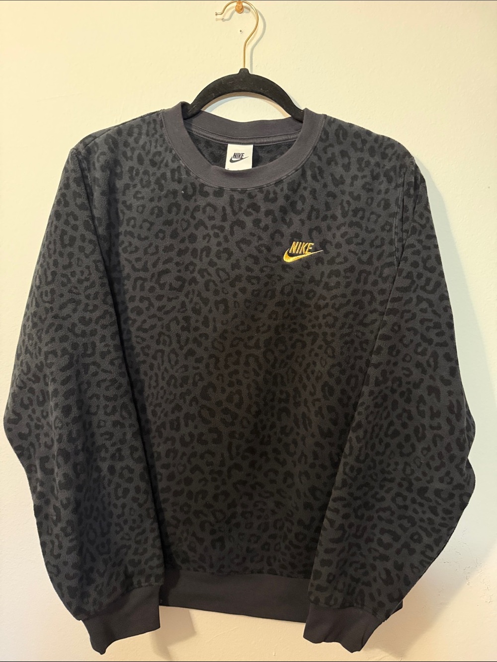 Nike Women’s Black Leopard-Print Crewneck with Gold Swoosh